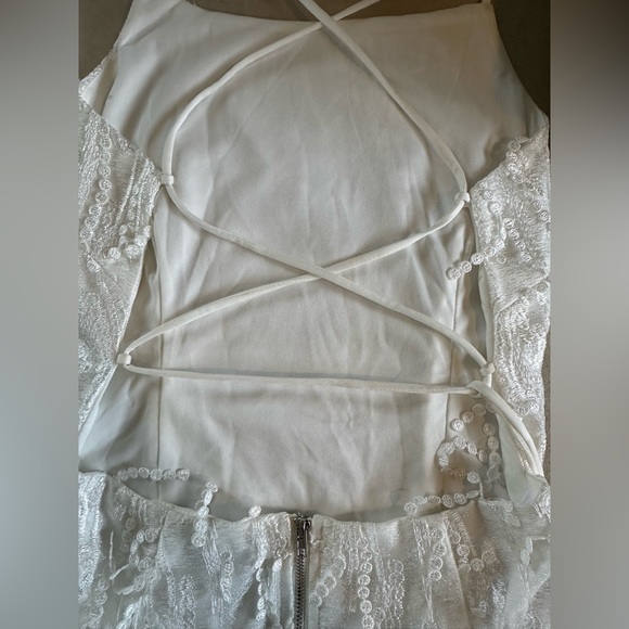 “Making Magic White Fringe Lace-Up Mini” dress from Lulus - Picture 8 of 9
